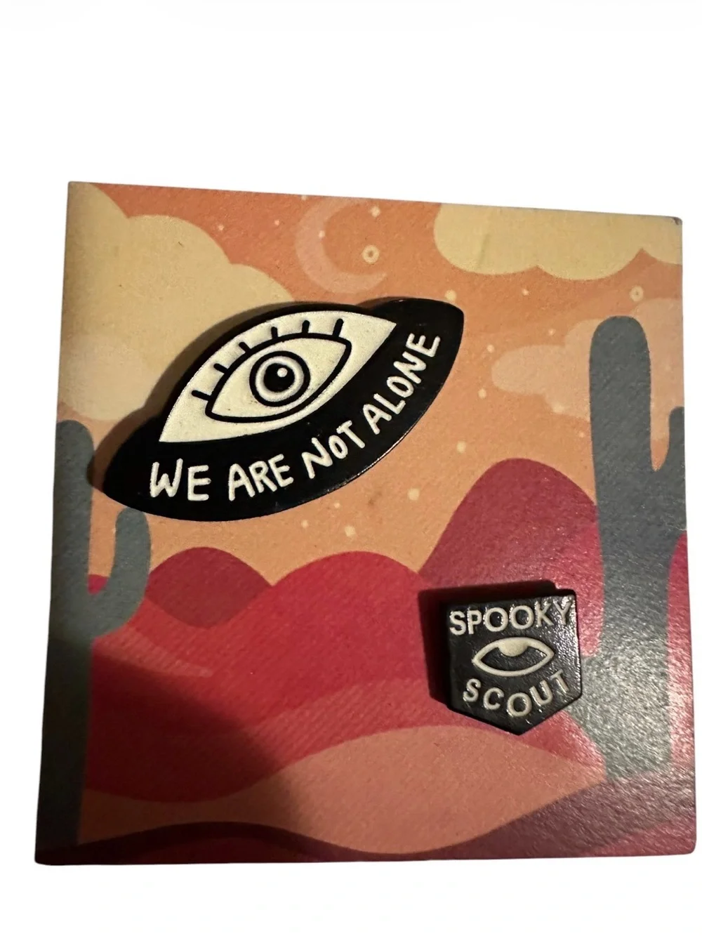 New Spooky Scouts Podcast Glow in the dark UFO Eye and Badge pin set